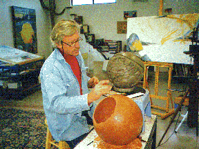 Anton working on  sculptures in his studio